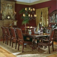 a dining room table with chairs and a chandelier