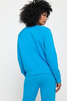 When your Crew Neck feels this good, you'll find any excuse to throw it on. Meet the Hamsa Forever Crew, a relaxed-fit layer equally ready for post-workout or the main event. Softness like no other Classic crew neck and raglan sleeve Relaxed fit with room to move Elevated rib edge detail Puff printed Hamsa graphic | Hamsa Forever Crew in Azul Spring Relaxed Activewear For Workout, Relaxed Spring Activewear For Workout, Relaxed Spring Workout Activewear, Moisture-wicking Relaxed Fit Sweats For Loungewear, Athleisure Sports Sweatshirt With Ribbed Cuffs, Athleisure Sweatshirt With Ribbed Cuffs For Sports, Moisture-wicking Athleisure Sweatshirt For Workout, Moisture-wicking Athleisure Sweats For Loungewear, Athleisure Moisture-wicking Sweats For Loungewear