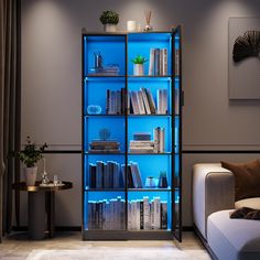 a living room filled with furniture and a book shelf covered in lots of blue lights