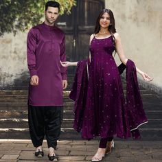 Menswear:- Faux Crepe Kurta in Purple.This Readymade attire is Enhanced with Buttons. Crafted in Chinese Collar Neck and Full Sleeve. Available with a Satin Salwar in Black Do note: Footwear shown in the image is for presentation purposes only. Half to one inch may vary in measurement. (Slight variation in actual color vs. image is possible) Salwar Kameez:-Readymade Faux Chinon Crepe Anarkali Kameez in Purple. This Round Neck and Strappy Sleeves attire with Shantoon Purple Lining is Enhanced wit Purple Self Design Kurta For Eid, Satin Salwar, Vs Image, Chinese Collar, Utsav Fashion, Collar Neck, Anarkali Suit, Anarkali Dress, Lace Border