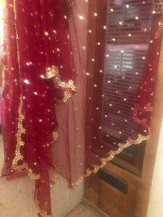 More dupatta here in our collection https://www.etsy.com/shop/neelcreations/?section_id=15880219 This Dupatta is sequin embroidered on net with beautiful golden border scallop. This can we your wedding dress chunni for Indian occasion wear for festival. This has perfect bling for you to look classy and ethnic at same time. This can even be your home decoration fabric for you can even wear them with lehenga. This can be made in any color. We can even make a jacket or poncho out of this. NOTE : Th Red Lehenga With Sheer Dupatta In Chinon, Wedding Traditional Wear With Chinon Dupatta, Red Embroidered Georgette Dupatta, Wedding Chanderi Dupatta With Dabka Work, Red Chinon Choli For Traditional Ceremonies, Wedding Traditional Wear With Dori Work In Chinon, Red Embroidered Dabka Work Chinon Fabric, Traditional Drape Red Embroidered Fabric With Dabka Work, Red Semi-stitched Saree With Dabka Work