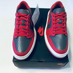 Air Jordan 1 Retro Elevate Low Shoes Sneakers Size 10 New With Box Jordan Id: Dh7004-006 If You Have Any Questions Please Ask Before Purchasing. Check Out All Of Our Other Great Items Rise To The Occasion In Style That Soars. This Jordan 1 Elevate Low "Dark Grey/Varsity Red/Sail" Women's Shoe Reworks An Icon's Original Magic With A Platform Sole And Low Cut Silhouette. Air Cushioning Keeps You Lifted, And Sleek Leather In Contrasting Colors Adds Visual Interest. Leather Provides A Structured Fee Modern Low-top Sneakers With Red Sole, Low-top Sneakers With Red Sole, Red Low-top Sneakers, Custom Low-top Synthetic Sneakers With Perforations, Lace-up Sneakers With Red Sole, Low-top Synthetic Basketball Shoes With Perforations, Red Sporty Custom Sneakers With Perforations, Sporty Red Custom Sneakers With Perforations, Red High-top Sneakers With Perforations