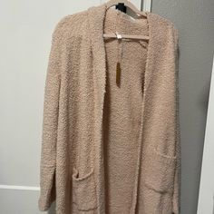 Skims Cozy Knit Robe In A Size L/Xl. This Robe Can Fit Anywhere From Xs-Xl Depending On The Fit You Would Like. The Color I Believe Is Dusk But I’m Not Sure. It’s A Sold Out Color And Not Available On The Website! Retails $90-$100. There’s No Tie For The Robe But It’s Brand New With The Tags! Comfortable Lounging Outerwear, Cozy Fit Soft Texture Cardigan For Loungewear, Comfortable Loungewear Cardigan, Comfy Cozy Loungewear Cardigan, Cozy Comfy Cardigan For Loungewear, Cozy Fit Cardigan With Soft Texture For Loungewear, Comfy Cozy Fit Cardigan For Loungewear, Soft Texture Cozy Fit Cardigan For Loungewear, Soft Textured Cardigan With Cozy Fit For Loungewear