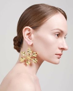 DESCRIPTION: The 'XENO-ORCHID' earring gold version is made from brass as the base, using gold-plating technology and exquisite polishing.COMPOSITION: Brass, Gold (18k)COLOUR: Gold Orchid Earrings, Earring Gold, Brass Gold, Gold Plating, Orchids, Gold Earrings, Gold Plate, Composition, Product Description