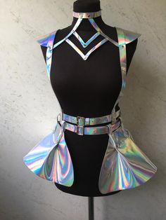 a mannequin with holographics on it's chest and collar