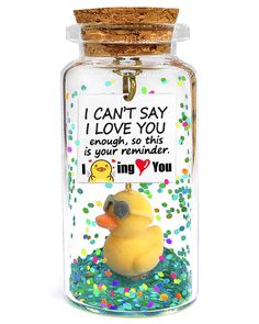 a glass jar with a rubber ducky in it that says i can't say i love you enough, so this is your reminder