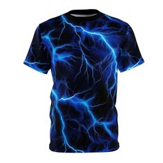 Light up the night and ignite the dance floor with our Men's Blue Lightning Rave Shirt, the perfect addition to any rave enthusiast's wardrobe. Featuring a bold blue lightning design, this shirt is sure to make a statement wherever you go. Crafted with high-quality materials, it offers both style and comfort for all-night dancing and partying. Whether you're hitting the club or dancing under the stars at a festival, this shirt will keep you looking cool and feeling confident. Ideal for men who w Fitted Rave T-shirt For Streetwear, Blue Crew Neck T-shirt For Festival, Matching Rave Outfits, Mens Rave Outfits, Rave Shirt, Rave Outfits Men, Blitz Design, Rave Shirts, Rave Style