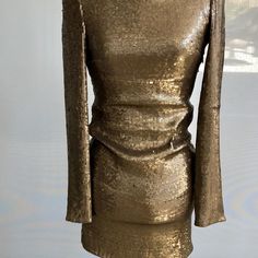 Stunning Bronze Silk Sequin Dress. Form Fitting But Has A Comfortable Spandex Stretch. Glamorous Stretch Mini Dress For Dinner, Elegant Stretch Sequin Evening Dress, Long Sleeve Sequin Cocktail Dress Stretch, Fitted Mini Sequin Dress For Fall, Fitted Luxury Sequin Dress, Luxury Fitted Sheath Dress, Glamorous Stretch Sheath Dress, Sheath Mini Dress With Stretch For Evening, Luxury Fitted Sequin Party Dress