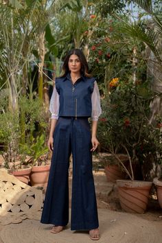 Denim Top with Bell Bottom Pants, Denim Two Piece Suit, Denim Jumpsuit Women, Puffy Sleeve, Blue Co ord Set, Crop Top with Wide Leg Pants Fabric - Denim  Sleeve - 3/4 Sleeves Work - Embroidery Work Color - Denim Shirt / Top Length - 20 Buttom Length - 39 Size - (XS), (S), (M), (L), (XL), (2XL) This outfit is a two-piece set designed for women. The top is made of denim and has net fabric sleeves that go up to about three-fourths of the arm length. It's paired with wide-leg pants, creating a coord Denim Cord Set Women, Denim Cord Set, Denim Coord Set Women, Blue Denim Outfits For Women, Western Pants For Women, Denim Co Ord Set, Denim Coord Set, Denim Coord, Pants Set Outfit Women