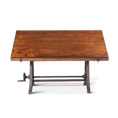 a wooden table sitting on top of a metal frame with an iron bar in the middle