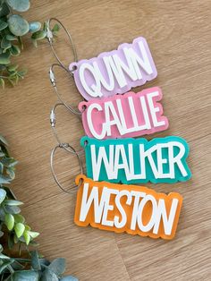 three magnets with the words gumm, callie, walker and weston on them