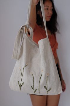 Handheld Natural Hobo Bag For Spring, Natural Handheld Hobo Bag For Spring, Bohemian Handheld Hobo Bag For Summer, Eco-friendly Beige Hobo Bag For Spring, Beige Summer Hobo Pouch Bag, Summer Beige Hobo Bag Pouch, Beige Pouch Hobo Bag For Summer, Spring Hobo Bag For Daily Use, Bohemian Beach Bag With Handles For Spring