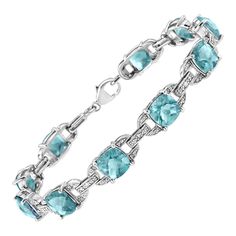 Classy and feminine, this blue topaz and diamond tennis bracelet is designed especially for your lady love. Styled in remarkable sterling silver this bracelet is embellished with 10 alluring prong set cushion cut blue topaz accentuated by 10 brilliant round cut diamonds in prong setting. Fastens with a secure clasp. Total diamond weight is 1/20 ctw and each cushion cut blue topaz measures 7x7 mm. 'Video Available Upon Request.' Product Features: Diamond Type: Natural White Diamonds Diamond Count Mode Tennis, Precious Stones Bracelet, Bracelet Tennis, Blue Topaz Bracelet, Silver Wedding Jewelry, Antique Bracelets, Blue Tourmaline, Tennis Bracelet Diamond, Antique Diamond