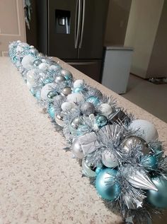 a kitchen counter top with ornaments on it