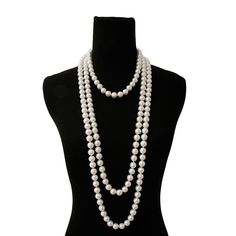 White Endless Glass Pearl Coco Designer Style Necklace features shimmering pearls measure 12 mm. With a classic and elegant design. Perfect for adding a touch of sophistication to any outfit, it's a must-have for any fashion-forward individual or industry professional. Classic Evening Necklaces, Classic Pearl White Necklace For Party, Classic Pearl White Pearl Necklace For Party, Classic Pearl Necklace For Party, Classic Pearl Necklace With Pearl Chain For Parties, Classic Round Necklaces For Party, Classic Long Necklaces For Party, Classic Pearl Chain Necklace For Party, Elegant 8mm Beads Jewelry For Formal Occasions