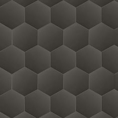 an abstract hexagonal pattern made up of dark gray and black tiles, which are very similar to the same color