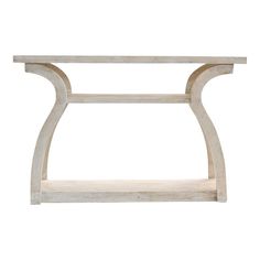 a white wooden shelf sitting on top of a wall