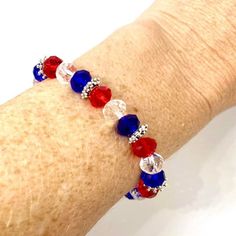 Celebrate July 4th with backyard BBQ's, fireworks and cool jewelry! This red, white and blue patriotic bracelet is made with briolette beads, Tibetan silver spacer beads and stretch cord, so one size fits all! Show off your red, white and blue this summer! Patriotic Bracelet, Cool Jewelry, Backyard Bbq, July 4th, Red White And Blue, Spacer Beads, Pandora Charm Bracelet, Fireworks, One Size Fits All