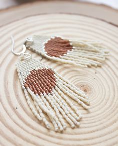 "These hand beaded earrings are made with delica seed beads in cream and pumpkin colors. Hanging from silver colored ear wires, they measure 3\" in length. Hand woven with durable high quality thread!" Natural Beaded Dangle Jewelry, Natural Color Beaded Dangle Jewelry, Handmade Cream Beaded Earrings With Round Beads, White Beaded Fringe Jewelry For Crafting, Beige Dangle Jewelry With Colorful Beads, Beige Beaded Dangle Jewelry, Handmade Cream Beaded Drop Earrings, Beaded Beige Dangle Jewelry, Handmade Cream Beaded Earrings