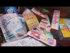 many different types of candy are piled on top of each other and labeled with names