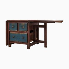 a wooden desk with two drawers on one side and an open drawer on the other