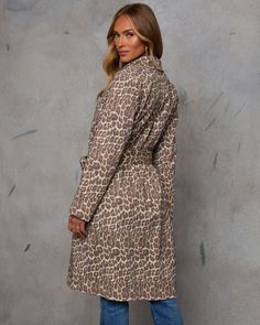 Perfect for crisp autumn strolls, the Be Free Animal Print Belted Trench Coat offers the allure of Parisian streets. Crafted from luxe twill fabric, this trench coat is your ticket to effortless romance and undeniable style. The bold animal print adds a touch of wild sophistication, while the detachable waist tie cinches your silhouette for that perfect, flattering fit. Featuring a front button closure, and practical breast and front slip pockets, this coat blends timeless trench elements with a Crisp Autumn, Sleeveless Cardigan, Belted Trench Coat, Swimwear Bottoms, Wrap Sweater, Floral Stripe, Be Free, Twill Fabric, New Tops