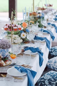 a long table with blue and white decor