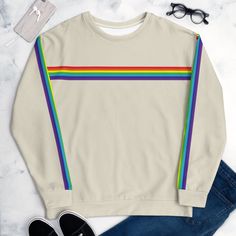 Feel and look amazingly stylish and trendy in this classic retro rainbow stripe sweater. Cosy and comfy you'll love wearing it anytime of the year specially when teamed up with a pair of leggings and sneekers. Size up for a casual slouchy oversized look. GENERAL INFORMATION Soft sweatshirt with brushed inside fleece. Please check the Size Guide in the listing photo before ordering. STYLE GUIDE *Genderless Crewneck *Cozy and soft *Brushed fleece fabric inside MATERIAL 70% polyester / 27% cotton / Rainbow Cotton Sweatshirt For Winter, Rainbow Crew Neck Top For Winter, Retro Striped Color Block Sweater, Casual Rainbow Crew Neck Sweatshirt, Rainbow Cotton Crew Neck Sweatshirt, Retro Rainbow Cotton Tops, Retro Striped Crew Neck Sweater, Multicolor Crew Neck Top With Contrast Stripes, Rainbow Clothes