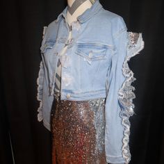 New With Tags Denim Cropped Jacket With Sequin Ruffle Detail On Sleeves Chic Fitted Denim Top With Ruffles, Trendy Stretch Light Wash Denim Jacket, Trendy Ruffled Denim Top For Fall, Spring Denim Top For Party, Trendy Spring Denim Top For Party, Spring Party Denim Top, Spring Party Trendy Denim Top, Chic Denim Top With Ruffles For Spring, Trendy Ruffled Denim Jacket For Fall