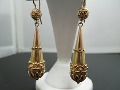 "For Sale: b964 Beautiful 15kt Yellow Gold Roughly 1900s British Dangle Earrings PLEASE READ ENTIRE DESCRIPTION BEFORE PURCHASING!! This is a beautiful pair of 15kt yellow gold dangle earrings. The stamp on these earrings would date them anywhere between 1837-1935. Stamped 15c on the hook. Would make a nice birthday, Christmas, Valentine's Day or Mother's Day gift. Good condition. Pre-owned. 15kt Yellow Gold (62.5% yellow gold) Length: 2\" Width: 1cm Weight: 6.4grams ---------------------------- Yellow Gold Wedding Band, Gold Dangle Earrings, Sterling Silver Chain Necklace, Filigree Ring, Gold Earrings Dangle, Etsy Earrings Dangle, Silver Chain Necklace, Saint Louis, Ear Jewelry