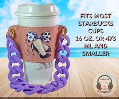 a coffee cup with a purple chain around it and the words, fits most starbucks cups