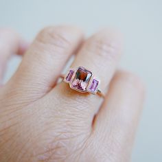 Charlotte Radiant Pink Tourmaline and Sapphire Ring, emerald cut bezel 3 stone ring, three stone wedding ring, classic engagement ring Pink Tourmaline Engagement Ring, Wednesdays We Wear Pink, Popular Rings, Pink Tourmaline Ring, Pink Sapphire Ring, 3 Stone Rings, Color Story, Classic Engagement Rings, Rose Gold Pink