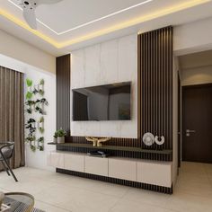 a living room filled with furniture and a flat screen tv on top of a wall