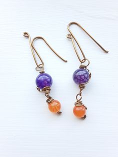 Handmade jewelry, copper wire wrapped earrings, bracelets, and necklaces, semi-precious gemstones and glass beads, unique design. ~Unique Design~ Each piece is designed and handcrafted by me. All of these unique styles are made to order especially for you. ~Who is this jewelry great for?~ An elegant, boho, classic style. You can wear it for a casual day or a dressed-up night on the town. This jewelry is a perfect gift for your mother, sister, girlfriend, wife, daughter or anyone who loves beautiful handmade jewelry. ~Materials~ Your handcrafted jewelry is made with various shades of copper or stainless steel wire. These wires are hypoallergenic for most people. They may tarnish over time if exposed to water. The beads used are semi-precious stones, glass, or ceramic.  ~Gifts~ Each order co Wire Wrapped Czech Glass Drop Earrings, Handmade Copper Wire Jewelry With Round Beads, Orange Hand Wrapped Bohemian Jewelry, Orange Bohemian Hand Wrapped Jewelry, Bohemian Hand Wrapped Orange Jewelry, Bohemian Orange Hand Wrapped Jewelry, Nickel-free Copper Wire Jewelry For Crafting, Wire Wrapped Healing Drop Earrings, Healing Wire Wrapped Drop Earrings