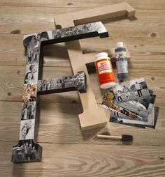 the letter f is made out of wood and has photos taped to it with glue