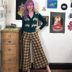 "Vintage Ultra Wide Leg Plaid Wool Pants, 1970s High Waisted Flare Leg Pants, Size XS Incredible vintage pants from the 70s, made by Alexander Beegle of Virginia Beach.  Cozy colors of beige, sage green, pumpkin orange and olive green.  These unlined pants feel like wool but are not itchy at all.  Super high waist with a back zipper, fitted through the hip and thigh - and with an ultra wide flare leg! These are definitely a show-stopping statement piece.  There is no size marked on these but they measure like a modern womens XS.  No condition issues!  Model is 5'11\" tall and wears a size medium (pants do not zip closed on model).  There is a little bit of hem to take the pants down about an inch if desired. For best fit, please compare the measurements below to your own, or to the size ch Retro Wide Leg Bottoms For Fall, Vintage High Waist Wide Leg Pants For Fall, Fall Retro High-waisted Pants, Retro High-waisted Pants For Fall, 70s Inspired Wide Leg Fall Bottoms, Vintage Wide Leg Full Length Pants For Fall, Retro Fitted Wide Leg Pants For Fall, 70s Inspired Wide Leg Bottoms For Fall, 70s Inspired Wide Leg Pants For Fall