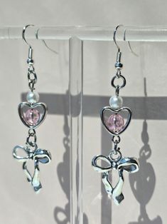 Approx. length: 1.5" inches Discover our whimsical & dreamy earring collection. Handmade with quality material and made to last. Your Orders Make Our Day! Nickel-free Cute Jewelry For Party, Pink Heart Earrings For Wedding, Cute Heart-shaped Metal Jewelry, Valentine's Day Metal Heart Dangle Earrings, Pink Whimsical Metal Jewelry, Sterling Silver Dangle Heart Earrings For Party, Charming Pink Jewelry For Party, Whimsical Pink Metal Jewelry, Cute Hypoallergenic Jewelry For Parties