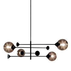 a chandelier with five balls hanging from it's center and four lights on each end