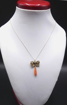 "Antique 14k gold chain and gold over sterling silver w diamonds/coral pendant necklace In good antique condition, Necklace 17\" ½ long. Pendant 1\" ¼ long ¾\" wide. Coral drop 16 mm x 4 mm. Weighs 2.8 gram. Marked 14k on the clasp. Thanks. This item ship to US only" Hallmarked Pendant Costume Necklace, Costume Jewelry Pendant Necklace, Antique Gold Chain Necklace Gift, Antique Gold Chain Necklace For Gift, Elegant Orange Pendant Necklaces, Elegant Long Orange Necklace, Antique Gold Plated Necklace For Formal Occasions, Elegant Orange Necklace With Lobster Clasp, Orange Victorian Jewelry For Gift