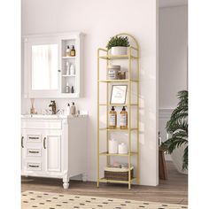 a bathroom with a gold shelf next to a white sink and a potted plant