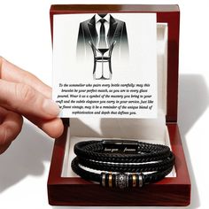 Introducing the Sommelier's Signature Bracelet — a symbol of refined taste and professional elegance. Crafted with the finesse of a master vintner's touch, this bracelet is designed to parallel the subtlety and depth of a fine wine. Its woven leather exudes a vintage charm, while the stainless steel accents mirror the polished look of a sommelier at work. Encased in a handsome display box, complete with a personalized message card, it makes the perfect accessory for the discerning sommelier who Black Jewelry For Business On Father's Day, Elegant Engraved Bracelet For Formal Occasions, Elegant Anniversary Jewelry, Gift Ready, Modern Bracelets For Father's Day Gift, Modern Bracelet For Father's Day Gift, Luxury Engraved Bracelets, Classic Jewelry With Gift Box For Father's Day, Luxury Jewelry With Gift Box, Classic Jewelry For Father's Day With Gift Box