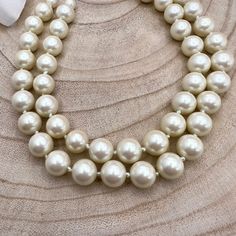 These classic double strand pearls are in perfect condition and dress up a little black dress and more!   Never know when you might need to bring out the classy, beautiful woman you are! Classic Pearl White Pearl Necklace For Party, Classic Pearl White Necklace For Party, Classic Pearl Necklace With Pearl Chain For Parties, Classic Pearl Necklace For Party, Chic Pearl White Pearl Necklace For Party, Chic Pearl White Necklace For Party, Elegant Cream Pearl Necklace For Formal Occasions, Classic Pearl Necklace For Evening, Classic Evening Pearl Necklace With Round Beads