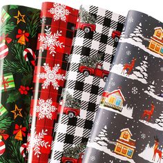 four christmas wrappings are lined up next to each other