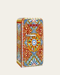 an artisticly designed, brightly colored refrigerator