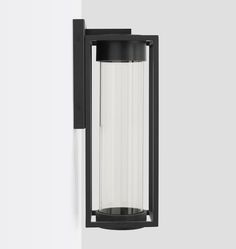 an outdoor wall light that is black and white