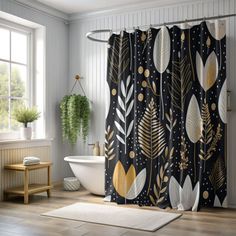 the shower curtain is decorated with gold and black leaves on a dark background, along with a white bathtub