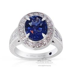 Platinum custom Ceylon sapphire ring containing an untreated oval cut blue sapphire measuring 9.85 x 8.04 x 4.90 mm weighing 3.03 carat. Type II. Medium-dark, moderately strong, blue color GIA B 6/4, set with 20 round brilliant cut diamonds with a weight of 0.60 cts & 10 baguette-cut diamonds with an approx diamond weight of 0.44 cts approximate total diamond weight 1.04 ct's VS - Si clarity G-H color. Incredible sapphire and custom platinum ring, this 3.03 carat no heat sapphire set carries a w Gia Certified Oval Sapphire Ring In Platinum, Oval Sapphire Ring Gia Certified, Gia Certified Oval Lab-created Sapphire Ring, Luxury Oval Lab-created Sapphire Ring, Platinum Sapphire Ring, Ceylon Sapphire Ring, Ceylon Sapphire, Baguette Cut Diamond, No Heat