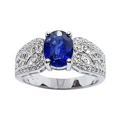 Blue Sapphire 1.27 carats with Diamond 0.21 carat Ring set in 18 Karat White Gold Settings Width: 0.6 cm Length: 0.9 cm Ring Size: 57 Total Weight: 7.19 grams "We first opened doors in 1980 when it was then situated in the vicinity of the Victory Monument; a small and modest storefront with a couple of counters. From its humble beginnings to where it stands today, our company has proven its abilities as a jeweler. Since the beginning, we have been supplying fine quality pieces to dealers, wholes Oval Sapphire Ring With Pave Setting In Platinum, Classic Blue Diamond Ring With Accents, Classic Sapphire Rings With Pave Setting, Oval Sapphire Ring With Pave Setting, Classic Sapphire Jewelry With Pave Setting, Fine Jewelry Sapphire Ring With Pave Setting, Classic Oval Sapphire Ring With Pave Setting, Classic Sapphire Ring With Pave Setting, Sapphire Platinum Jewelry With Pave Setting