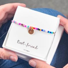 Personalised Beaded bracelet, Name Bracelet, Friendship bracelet, Best friend gifts, Custom Name bracelet, Customised Beaded bracelet.Gorgeous multi coloured stretch bracelet with hand stamped charm. Made from high quality plastic resin seed beads, these multi coloured rainbow mix will add colour to any out fit.The charm is a round metal disc ( silver or gold) which can be hand stamped with up to 3 letters of your choice.Lovely gift for that best friend how brightens up your life.COME COMPLETE W Teenager Birthday Gifts, Bracelet Y2k, Christmas Gifts For Teenagers, Bracelet Name, Feather Bracelet, Birthday Bracelet, Birthday Gifts For Teens, Christmas Gifts For Girlfriend, Bracelet Friendship