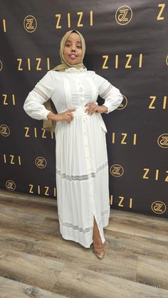 The All new Hodan Lace Dress is part of the 2023 Summer /Eid Collection. A super elegant and feminine maxi dress with lace on sleeves and bottom gives this dress more dimensions to be worn for many occasions such as school, going out, casual, and party wear with complete modesty. The dress features a fabric belt to adjust to your size and the flexibility to wear in many ways. It’s made with quality fabric making it comfortable, smooth and soft. Chiffon/Print Hijabs matched with the dresses are N Formal Maxi Dress With Lace Trim, Modest Long Sleeve Dress With Lace Trim, Elegant Long Dress With Lace Patchwork, Formal Maxi Dress With Lace Patchwork And Long Sleeves, Formal Maxi Dress With Lace Sleeves, White Lace Trim Maxi Dress For Casual Wear, Chic Long Sleeve Maxi Dress With Lace Patchwork, Elegant Long Maxi Dress With Lace Patchwork, Elegant White Maxi Dress With Lace Sleeves